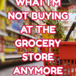 photo of grocery basket in the center of a grocery store aisle with large text overlay "what I'm not buying at the grocery store anymore"